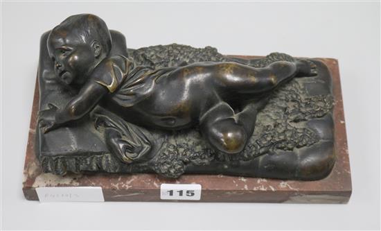 A bronze of a sleeping boy